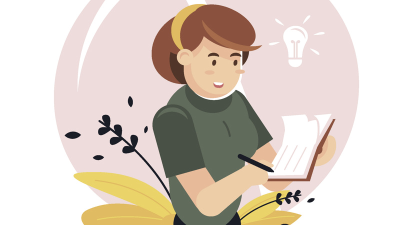 En person som skriver i en anteckningsbok.